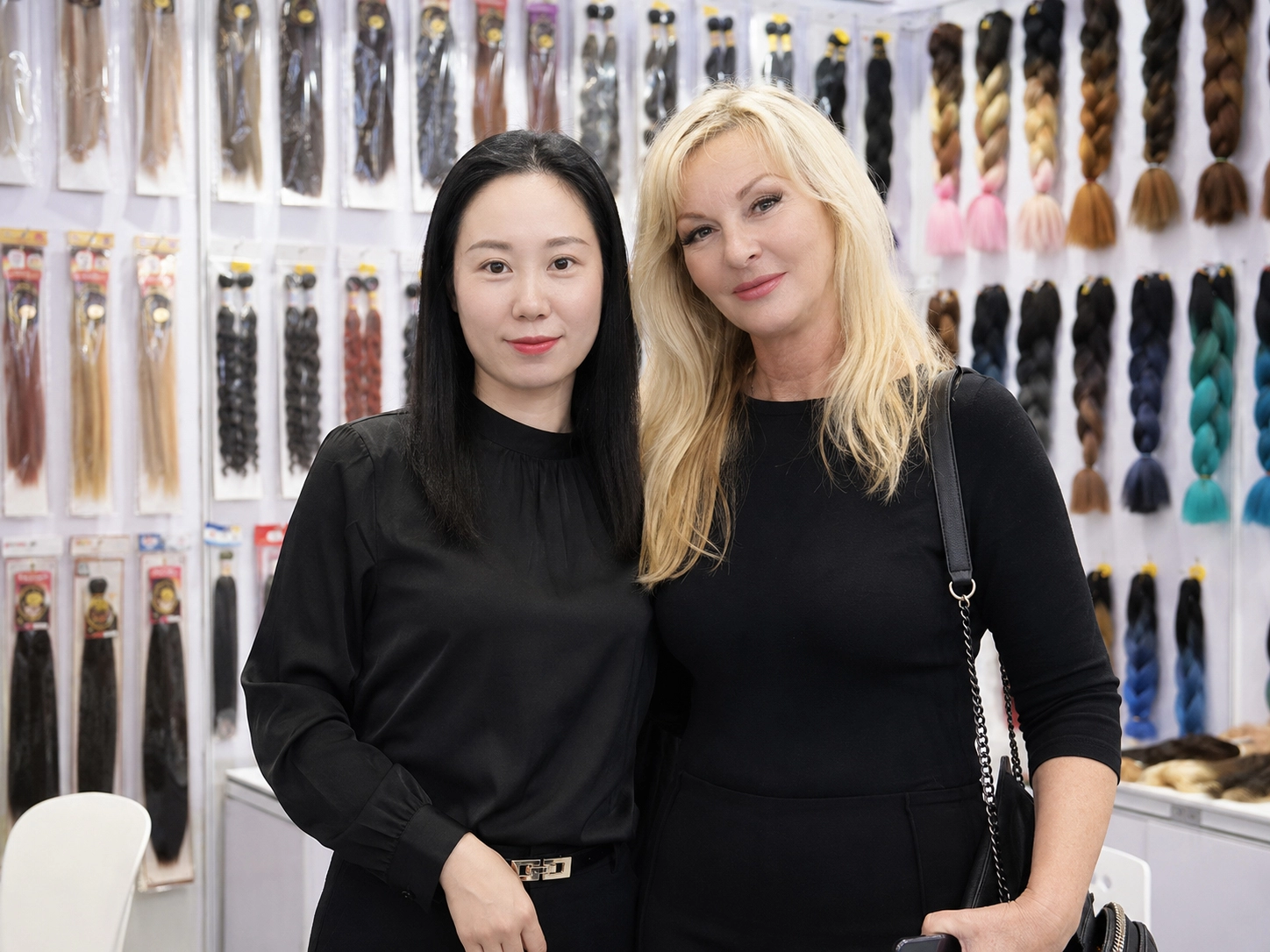 Hair product buyer and supplier at exhibition booth