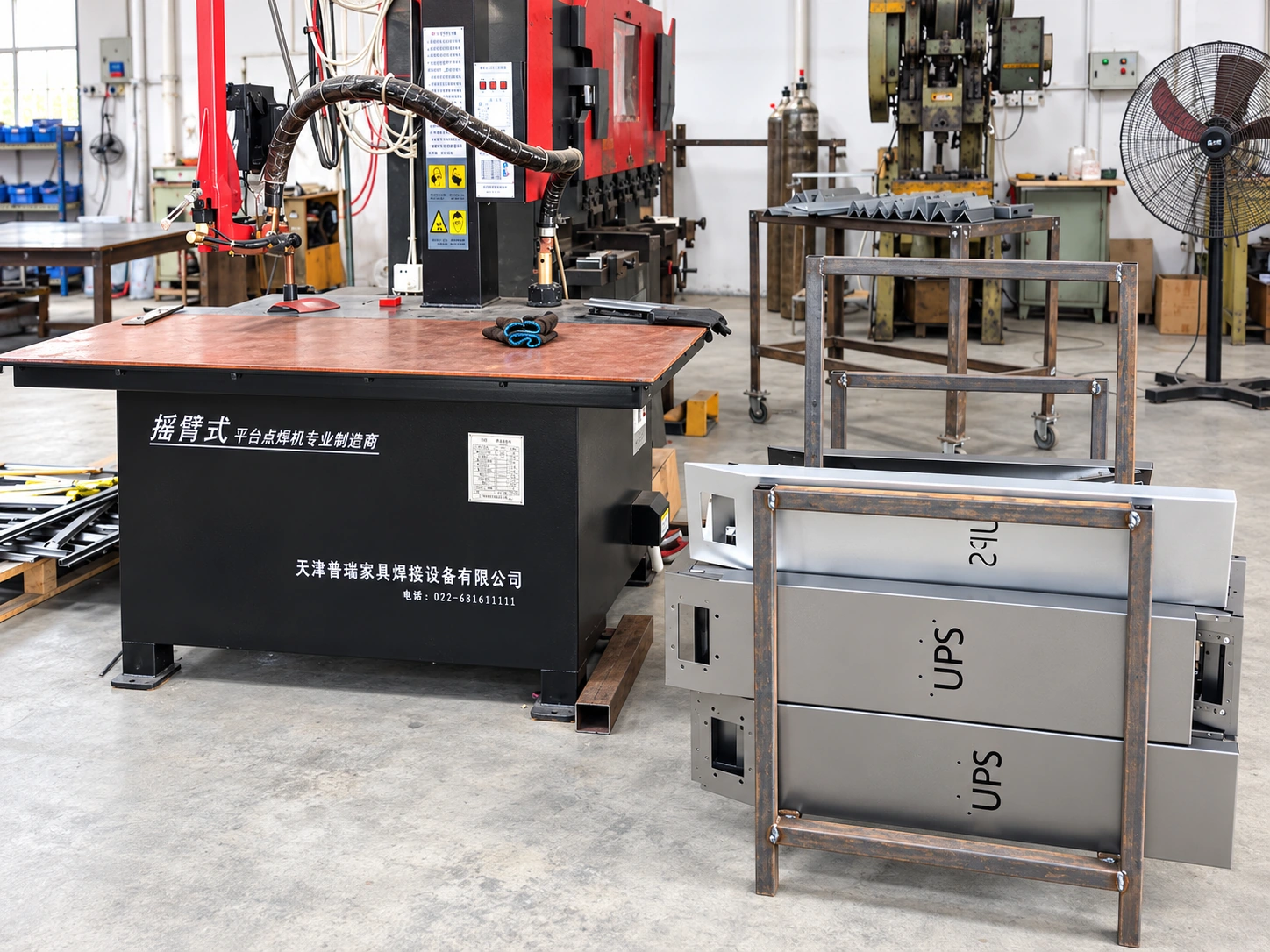 Welding station and enclosure parts in Ronghuilong workshop