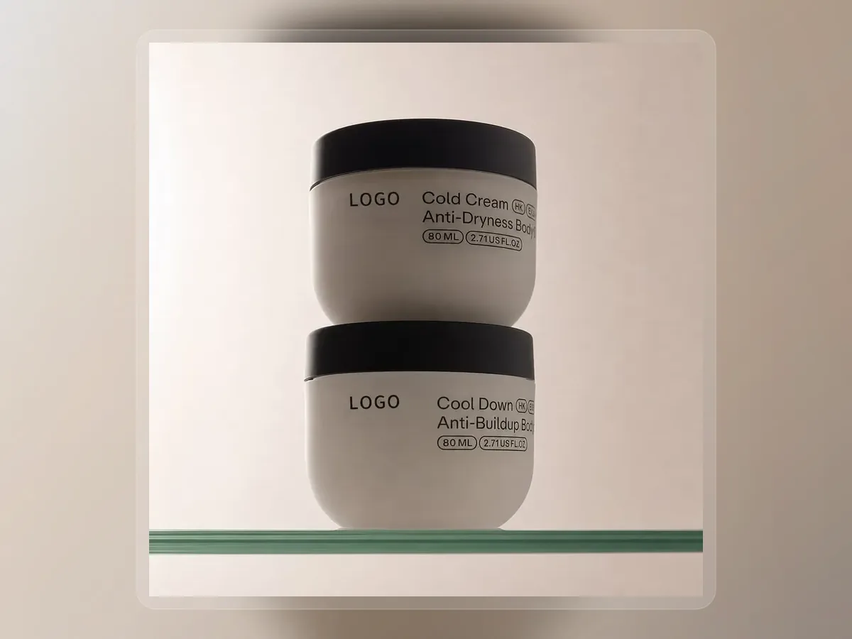 Two stacked protein repair cream jars with black lids on premium extended background