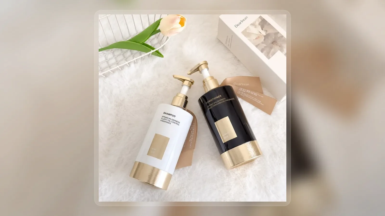 Black and white volumizing shampoo pump bottles in bright setting in wide presentation layout