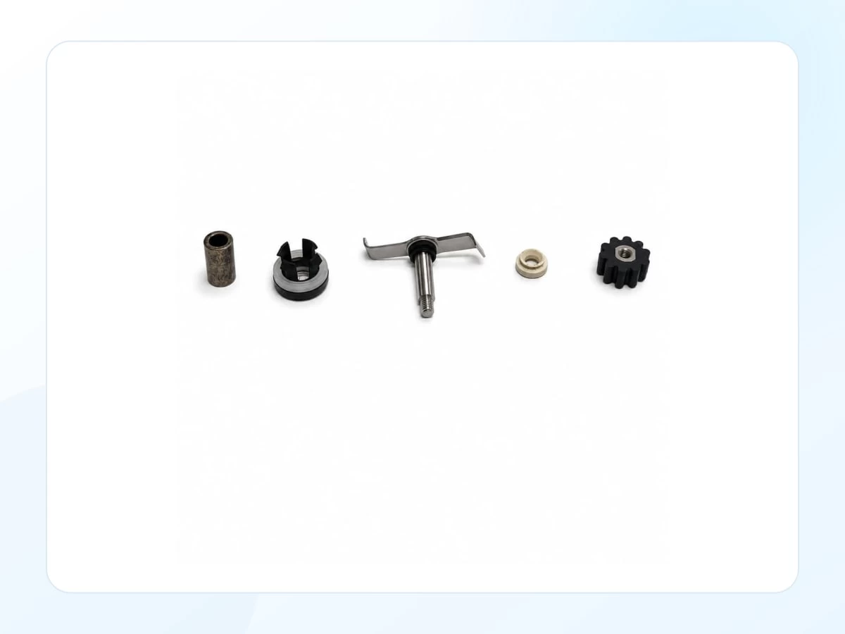 Assorted hardware inserts and small mechanical components on white background with key product features