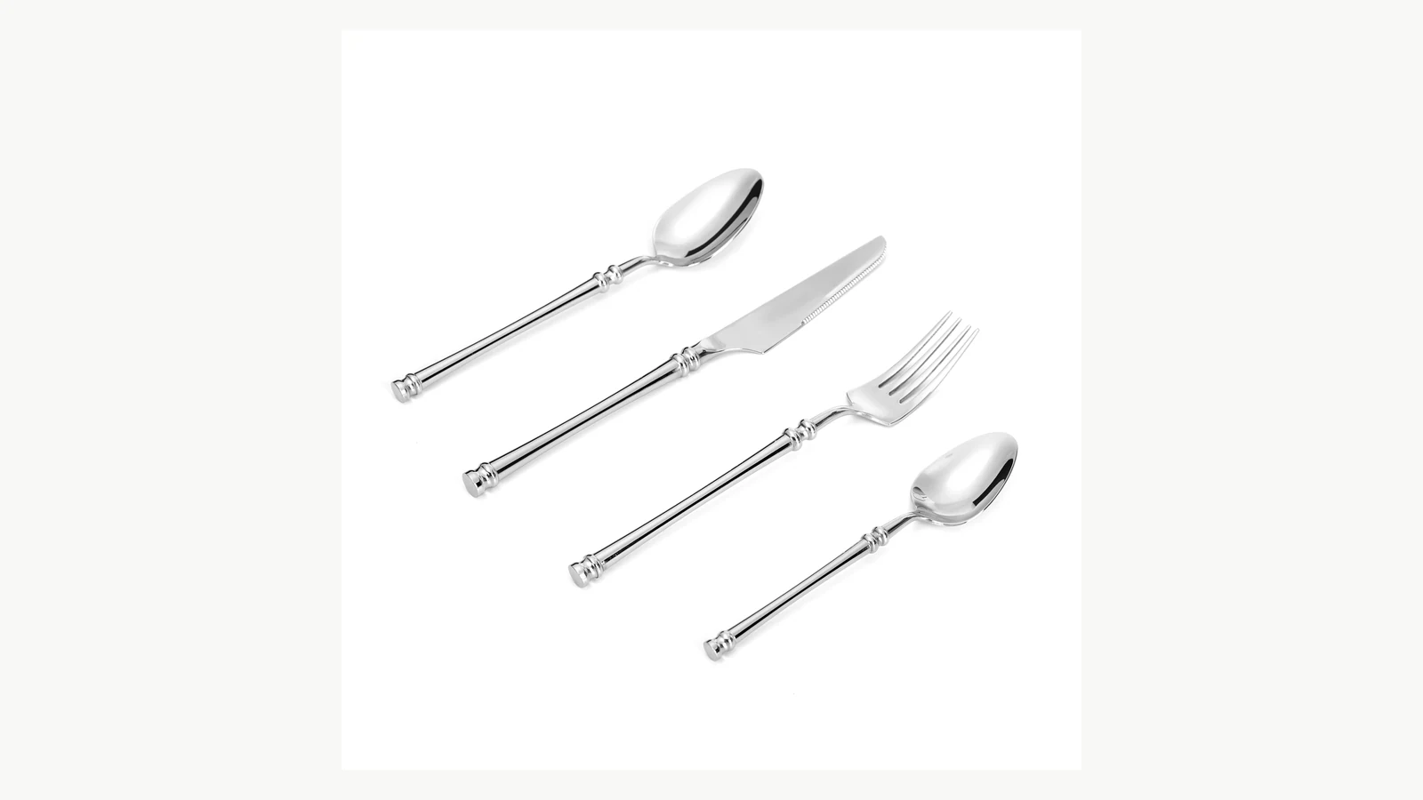 Fluted handle relief on coordinated stainless steel flatware pieces