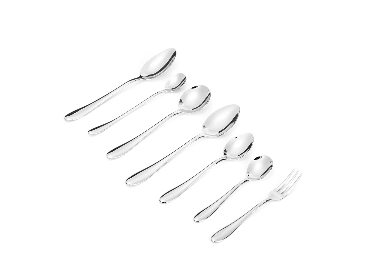 Extended Teardrop stainless steel flatware assortment on white background