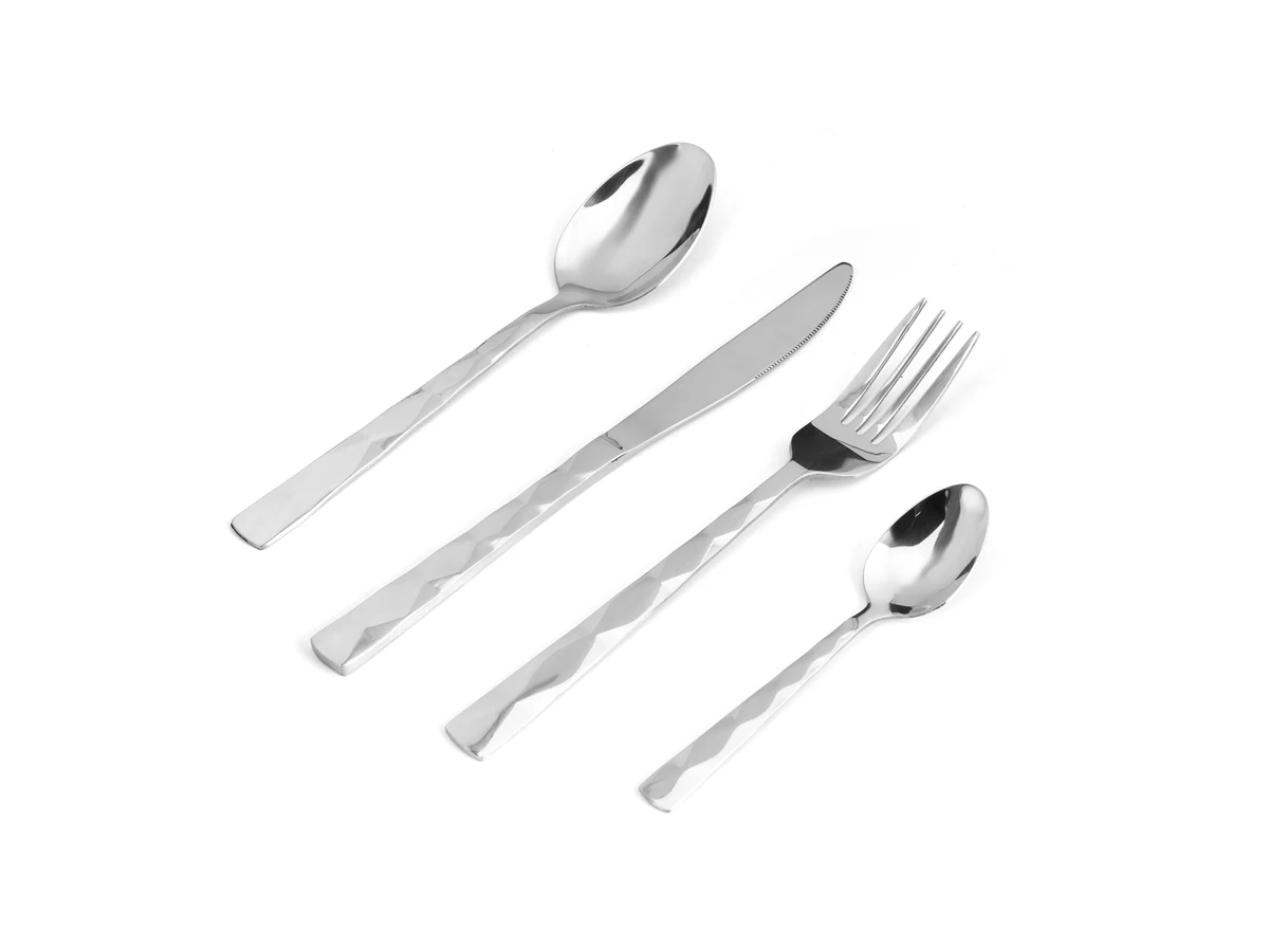 Scalloped-End stainless steel flatware assortment on white background