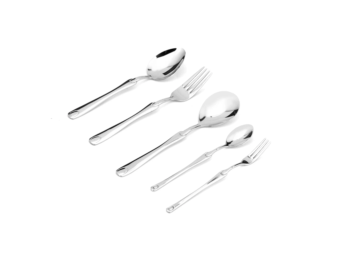 Ornamental Openwork Handle stainless steel flatware assortment on white background