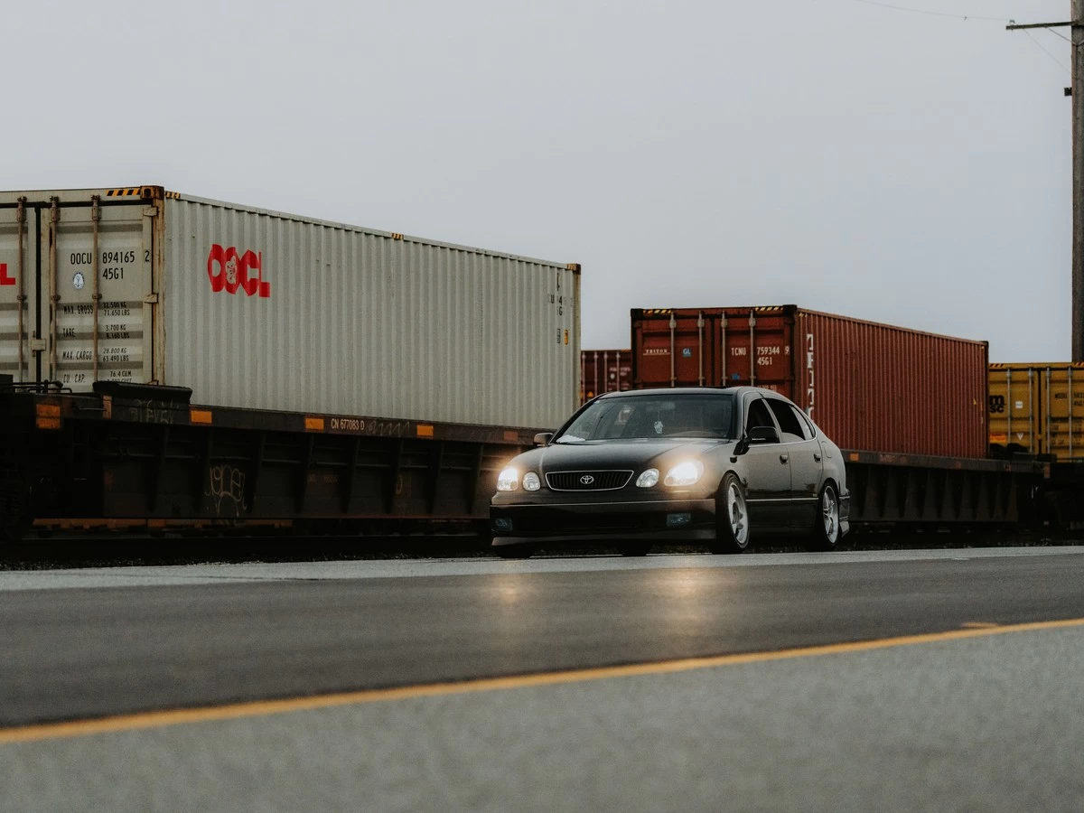 Used Vehicles Loaded Into Container At Yard