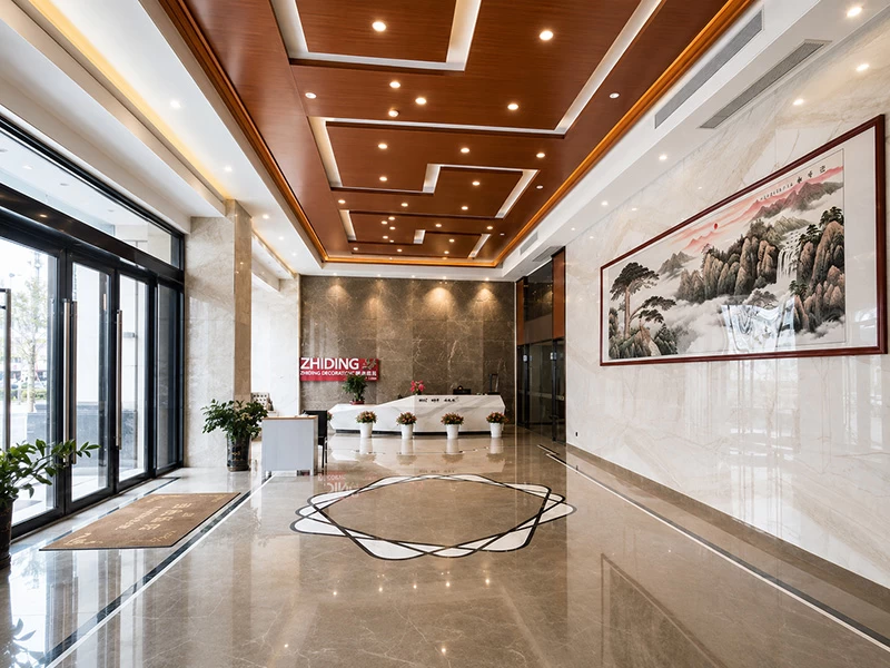 Wood-grain aluminum ceiling panels in a modern commercial lobby