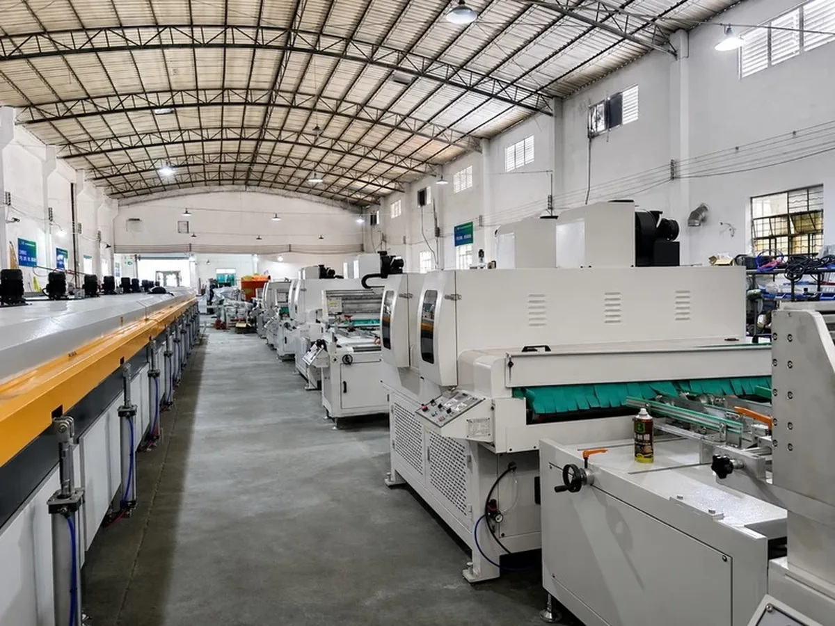 Long industrial processing line inside YISEN manufacturing workshop