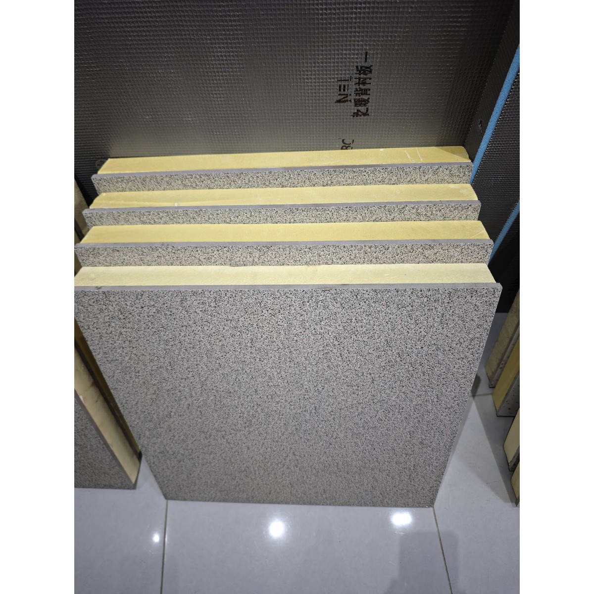 XPS insulated tile board layered edge construction