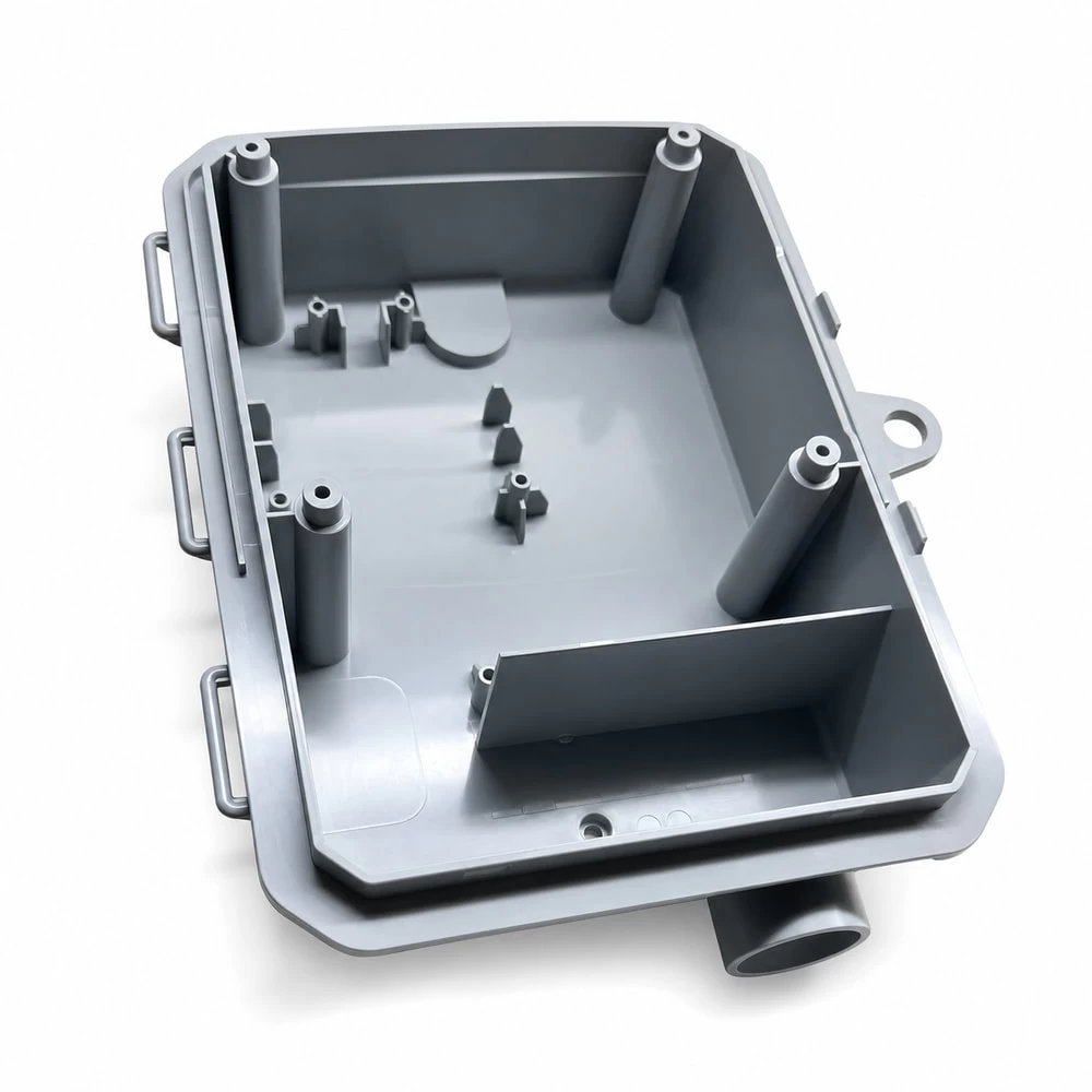 Injection molded electrical housing showing mounting tabs and bosses