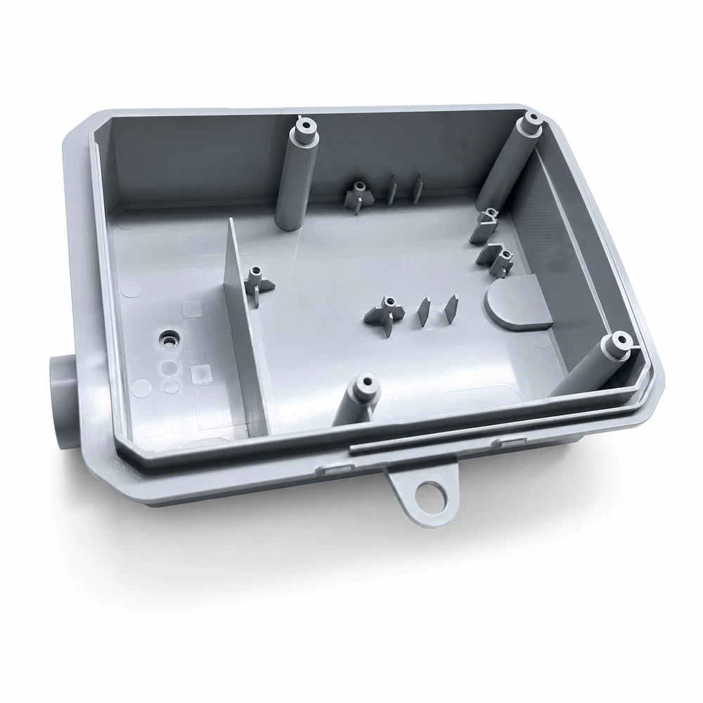 Gray plastic enclosure base with internal standoffs and side opening
