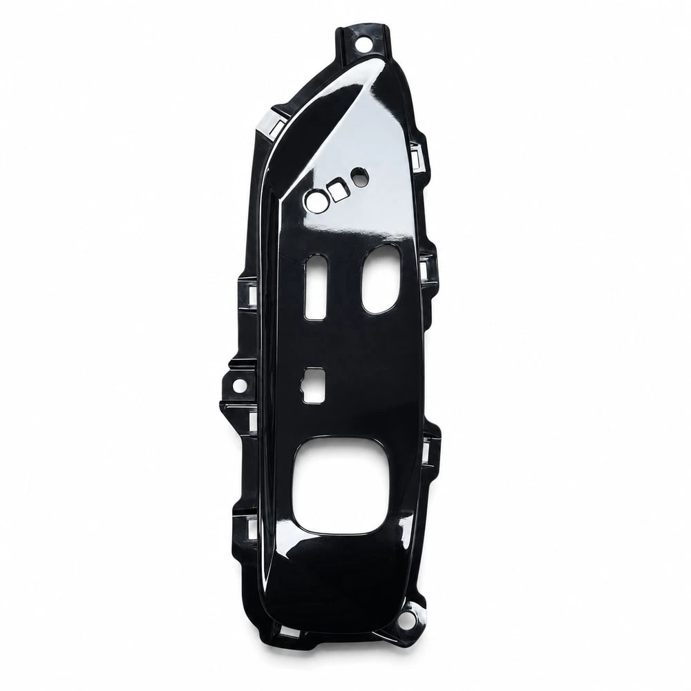 Vertical view of injection molded passenger seat control carrier