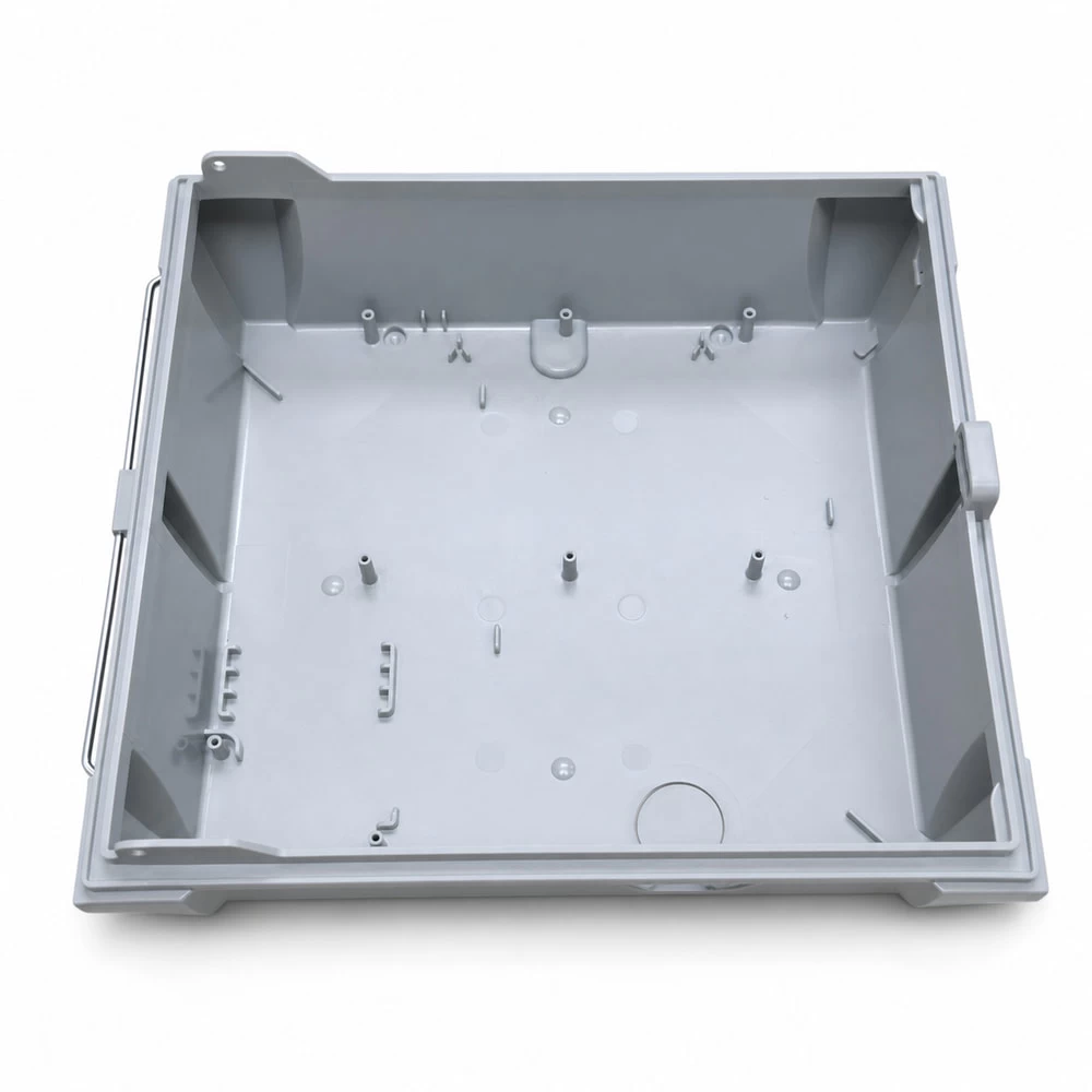 Gray injection molded electronics housing viewed from the front