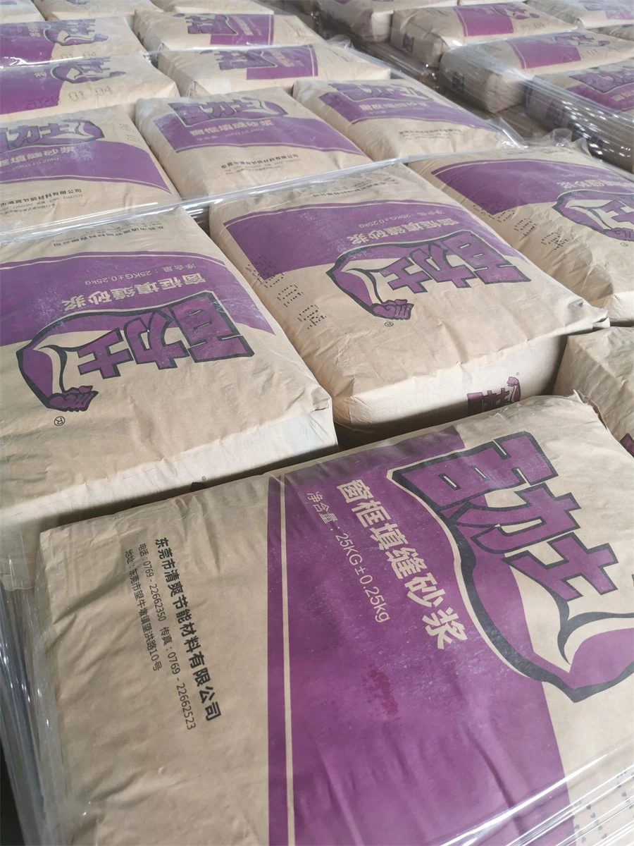 Purple bags of window frame gap filling mortar in warehouse storage