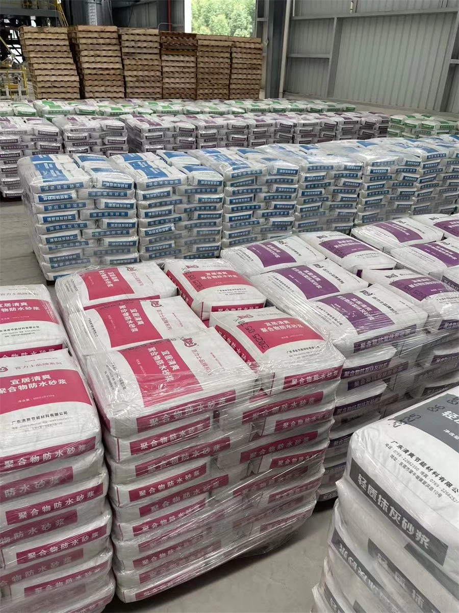Warehouse stock of red and blue polymer waterproofing mortar bags