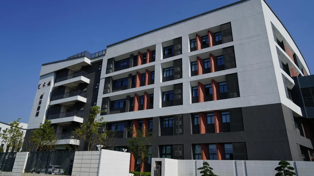 School exterior finished with decorative waterproofing slurry