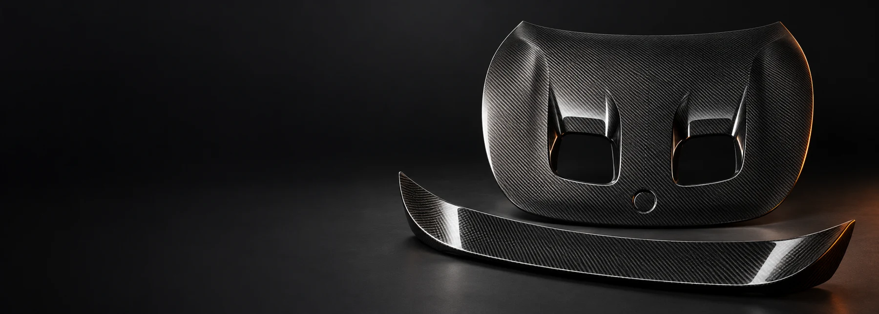 Carbon fiber hood and rear spoiler — studio composition